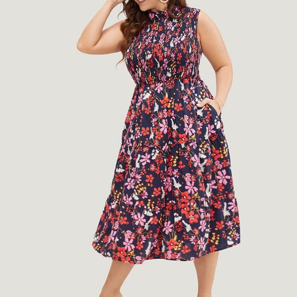 BloomChic Dresses & Skirts - NWT floral pocket dress with mock neck and button closure .